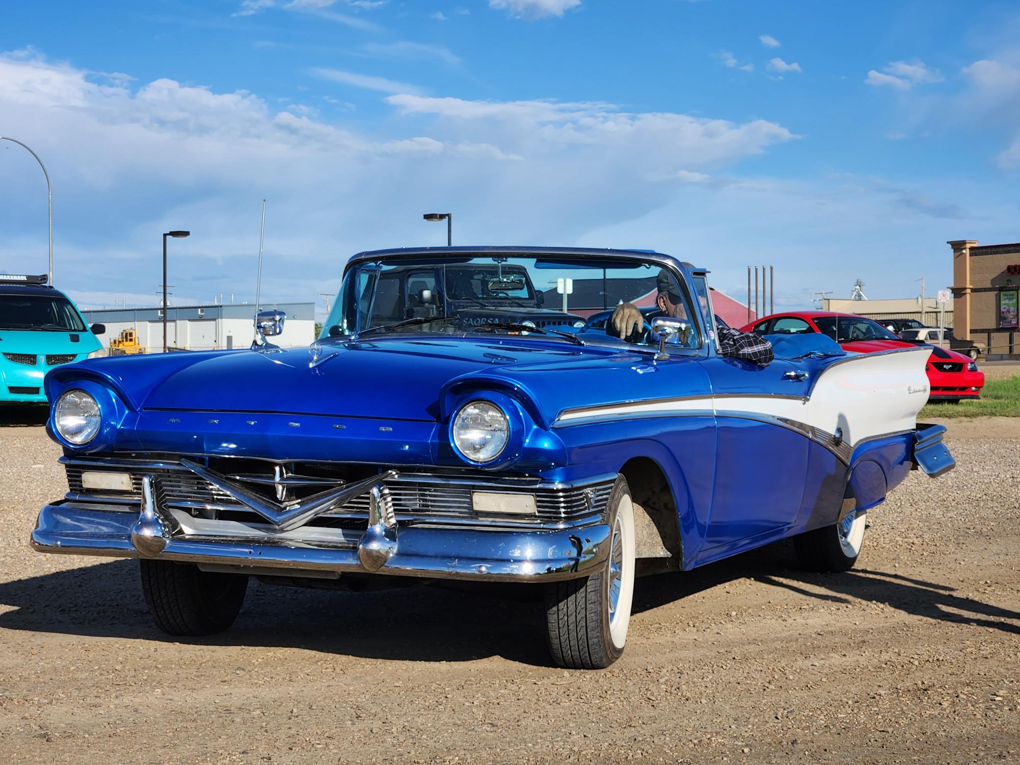 Chrome, cream, and a valve cover racing scene in Shaunavon